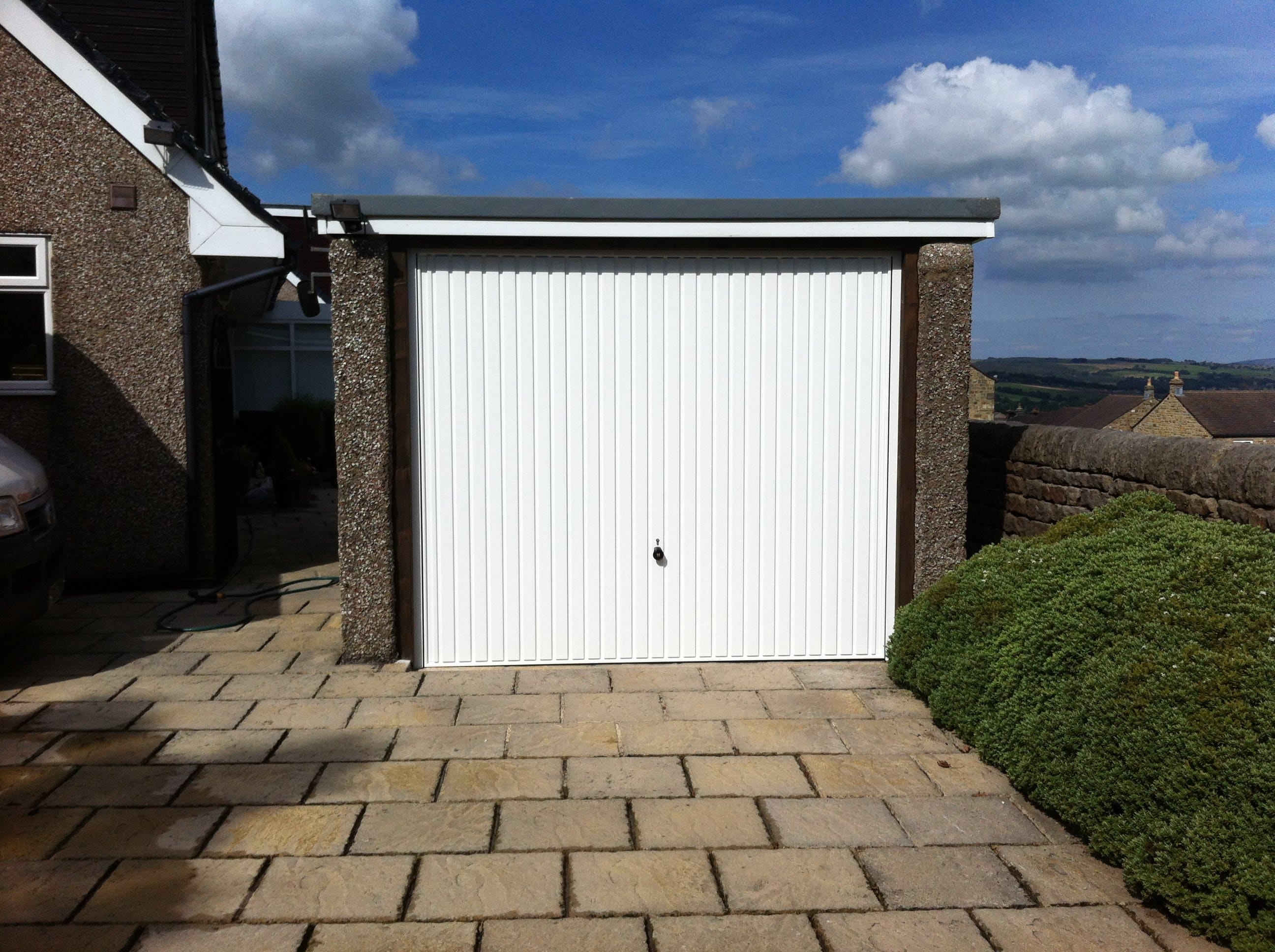 Hormann Vertical Up and Over in White By ABi Garage Doors