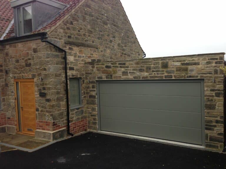 Hormann L-Ribbed Sectional in Stone Grey By ABi Garage Doors