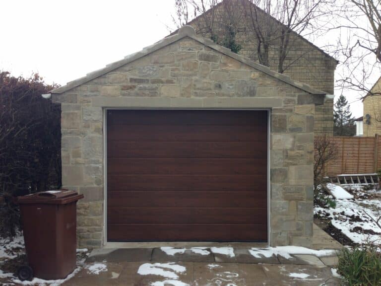 Hormann M-Ribbed Sectional in Decograin Rosewood By ABi Garage Doors