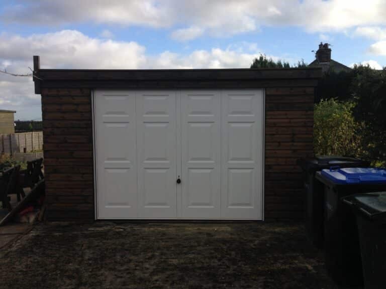 Hormann Georgian Up and Over in White with Timber Front By ABi Garage Doors