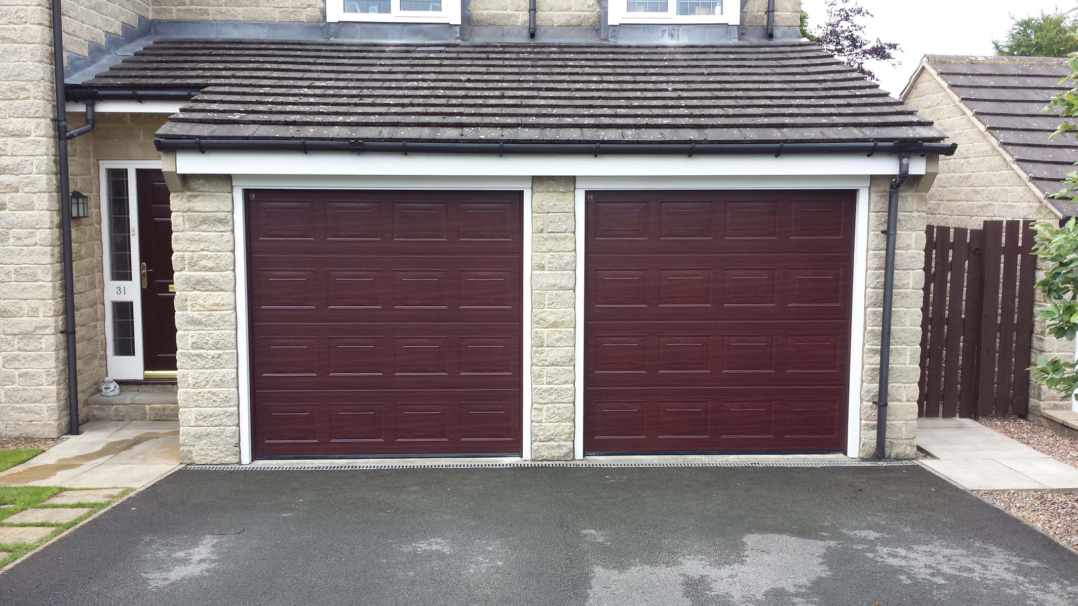 Hormann S-Panel Sectional Garage Doors in Rosewood By ABi