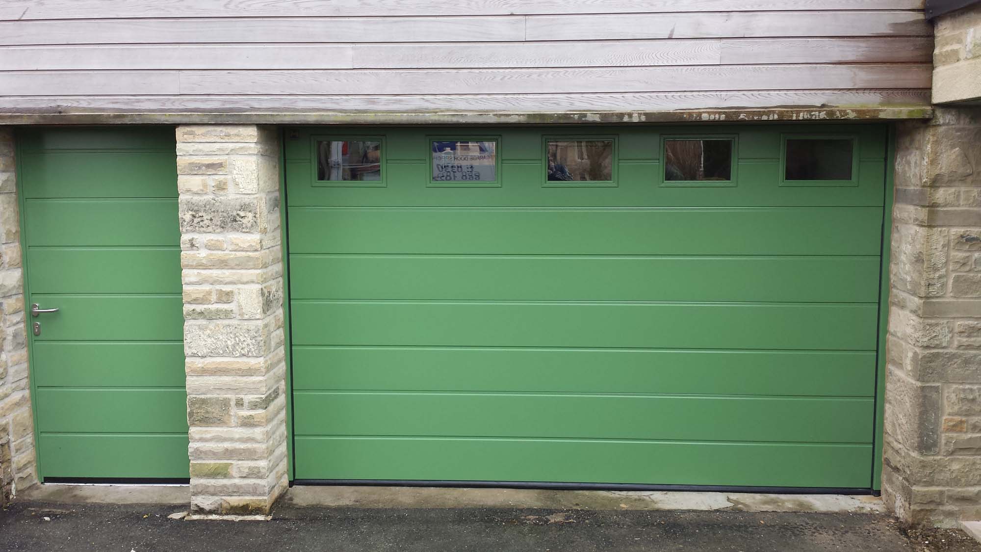 Hormann LPU40 Sectional Garage Door in Reseda Green By ABi