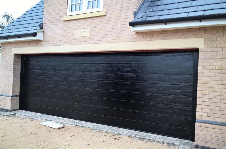Hormann Sectional Garage Door in Black Woodgrain By ABi