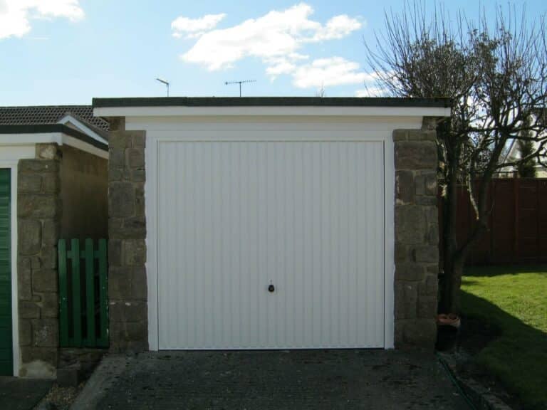 Hormann Up and Over Vertical Design in White By ABi Garage Doors