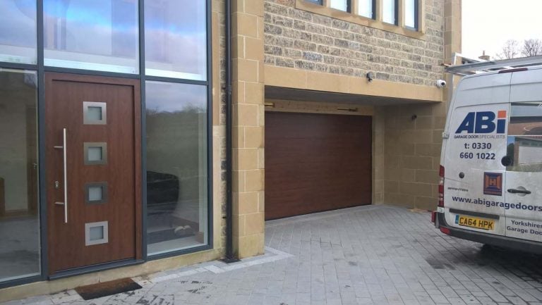 Hormann Front Entrance Door with Matching Sectional Garage Door By ABi