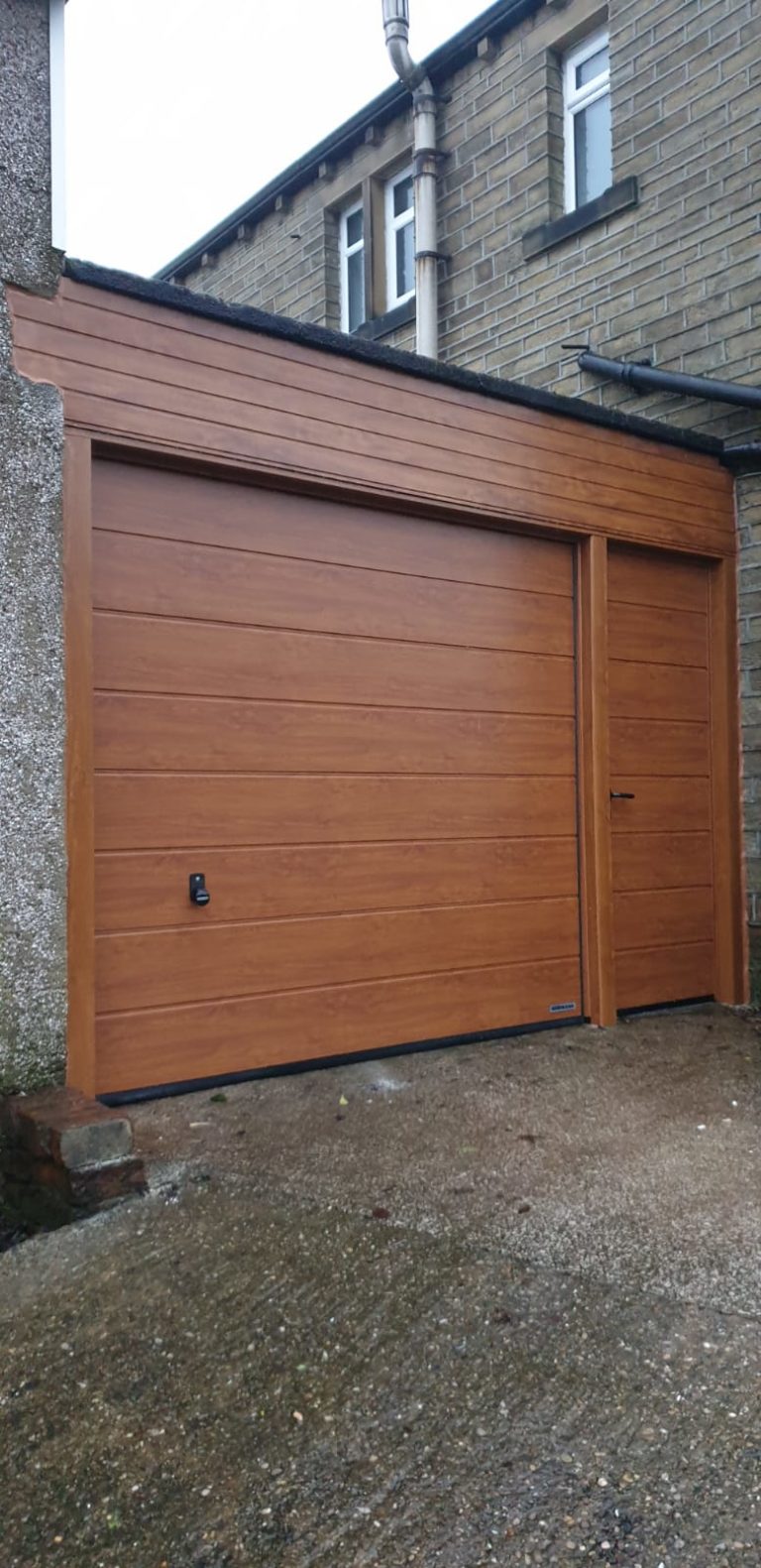 Hörmann Sectional Garage Door With A Garage Side Door