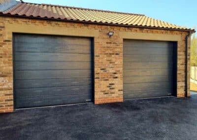 Double Garage with Single Double Ribbed Sectional Garage Doors