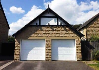 Double Garage with Single Georgian Sectional Garage Doors in White