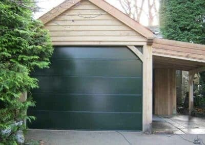 Large Ribbed Sectional Garage Door in Green