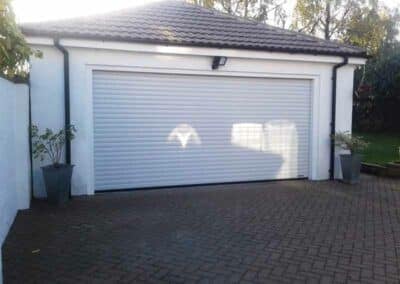 Double Width Garage With Double Roller Garage Door in White