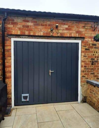 Side Hinged Garage Door in Anthracite Grey with Cat Flap