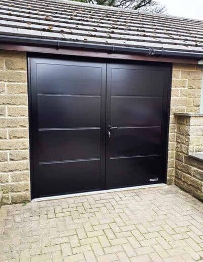 Black side hinged garage door