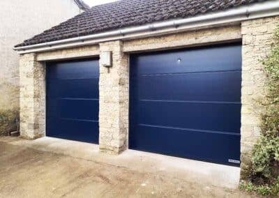 Blue Sectional Door with Large Ribbed Panels