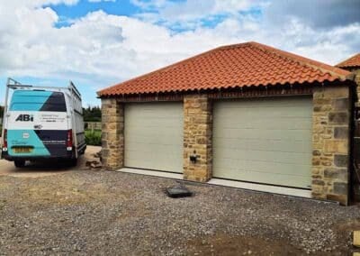 Grey Sectional Door with Medium Ribbed Panels