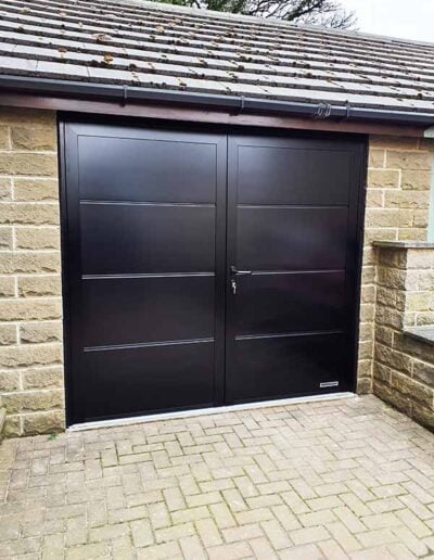 Insulated Black Side Hinged Garage Door with Large Panels