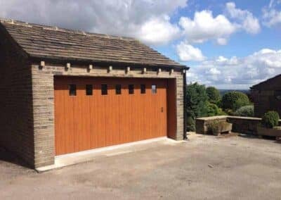 Side Sliding Garage Door in Wood Effect