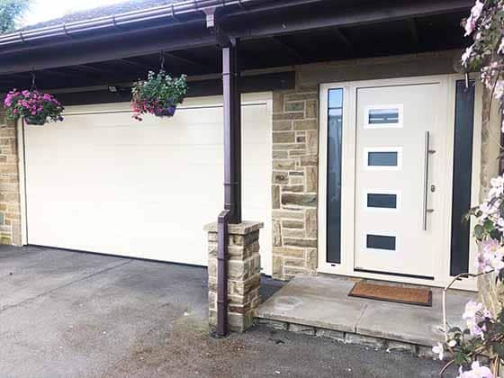 Matching front door and garage door installation by ABi