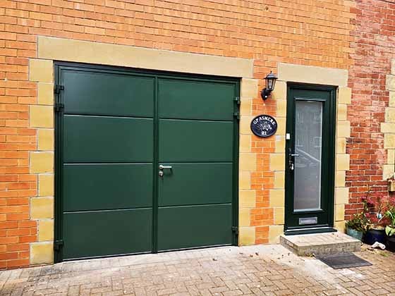 Installation of side hinged garage doors by ABi