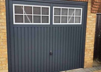 Steel Up and Over Garage Door with Windows Installed - Anthracite Grey