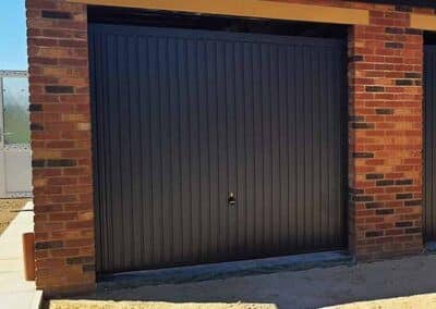 Steel Up and Over Garage Door in Black