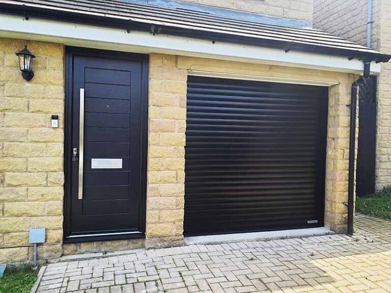 Matching Roller Garage Door with Composite Door in Black