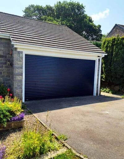 Blue roller garage door installed in Ripon by ABi