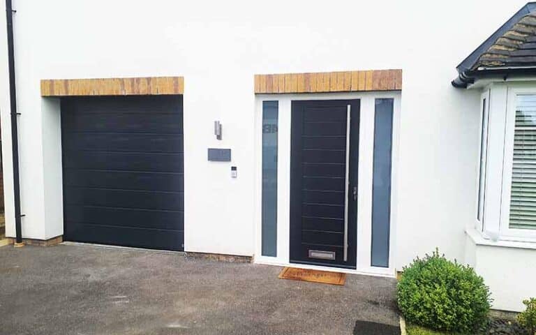 Matching Garage Door and Sectional Door in BLack