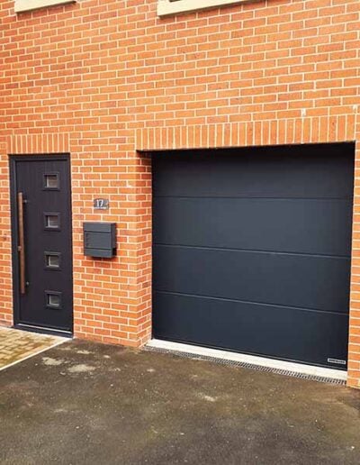 Matching garage door with composite front door in Ripon