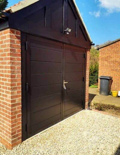 Black Side Hinged Garage Door installed By ABi