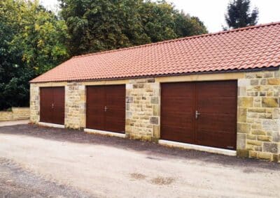 Recent installation of side hinged garage doors