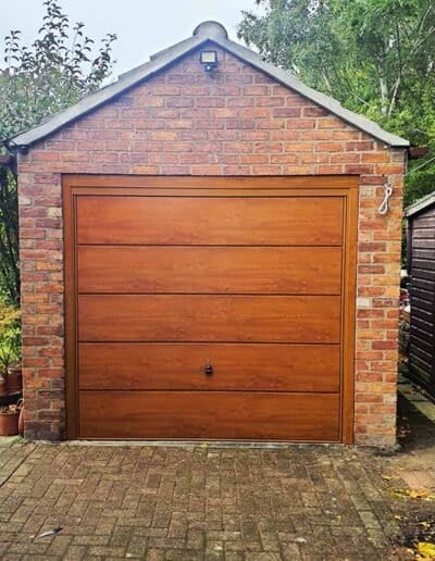 Sectional Garage Door in Decograin Oak